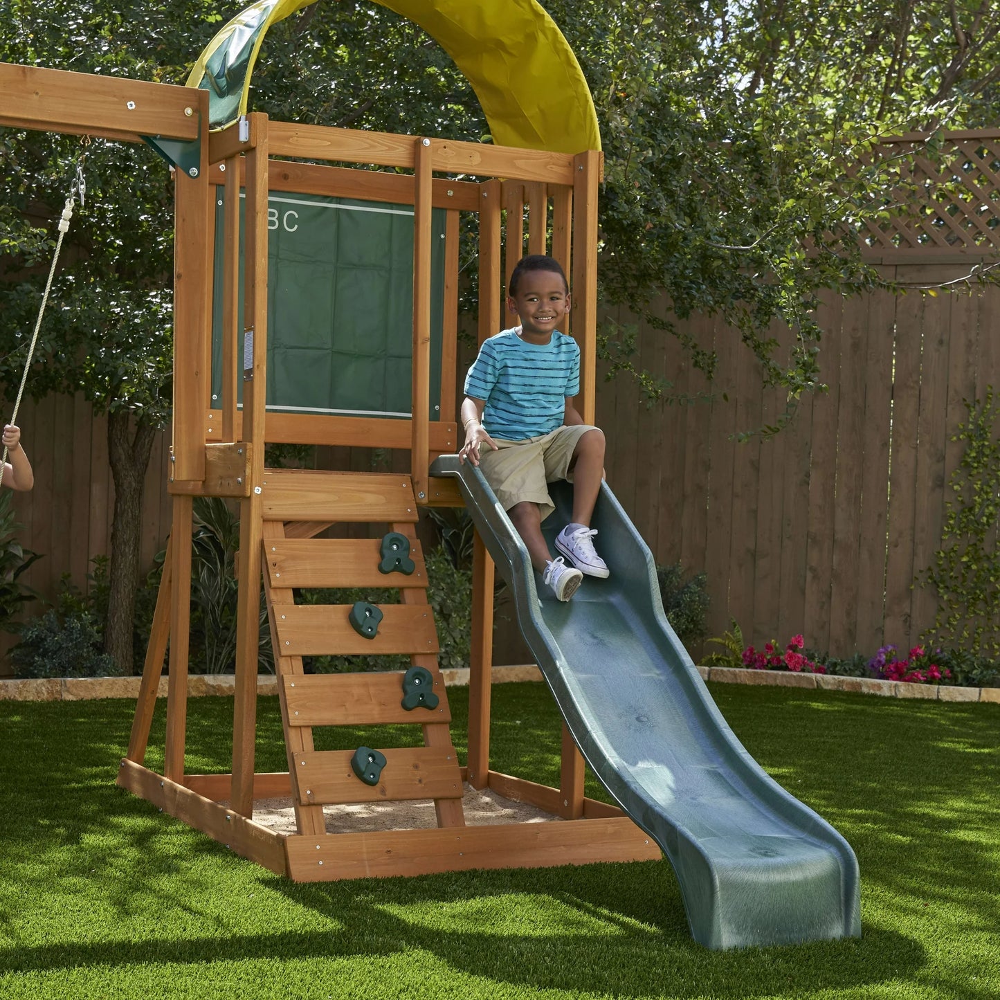 Kidkraft Ainsley Wooden Outdoor Swing Set with Slide and Rock Wall