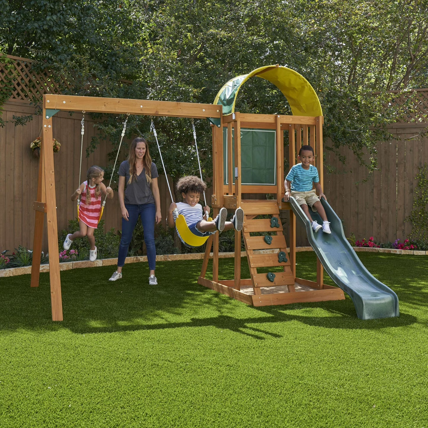 Kidkraft Ainsley Wooden Outdoor Swing Set with Slide and Rock Wall